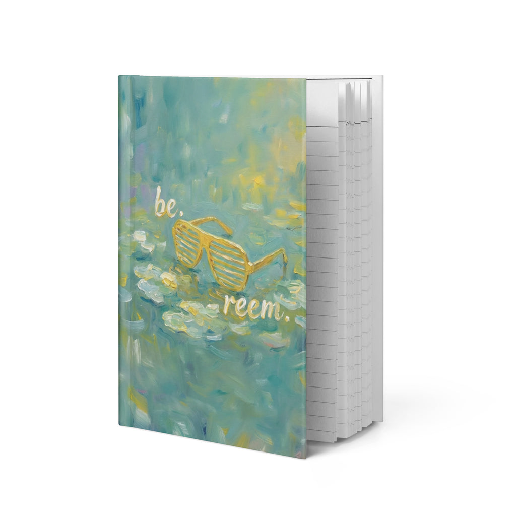 Be Reem Monet hardcover journal by Reem Tees in matte white, featuring a sleek front cover design.