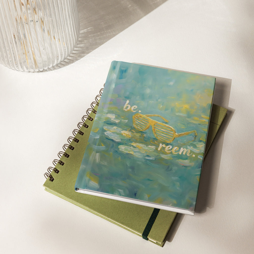 Be Reem Monet hardcover journal by Reem Tees with a matte white cover, measuring 8x5.75 inches, displayed front view.