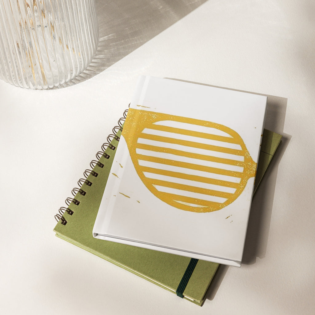 Matte white hardcover journal featuring Reem Sunglasses design, measuring 8x5.75 inches.