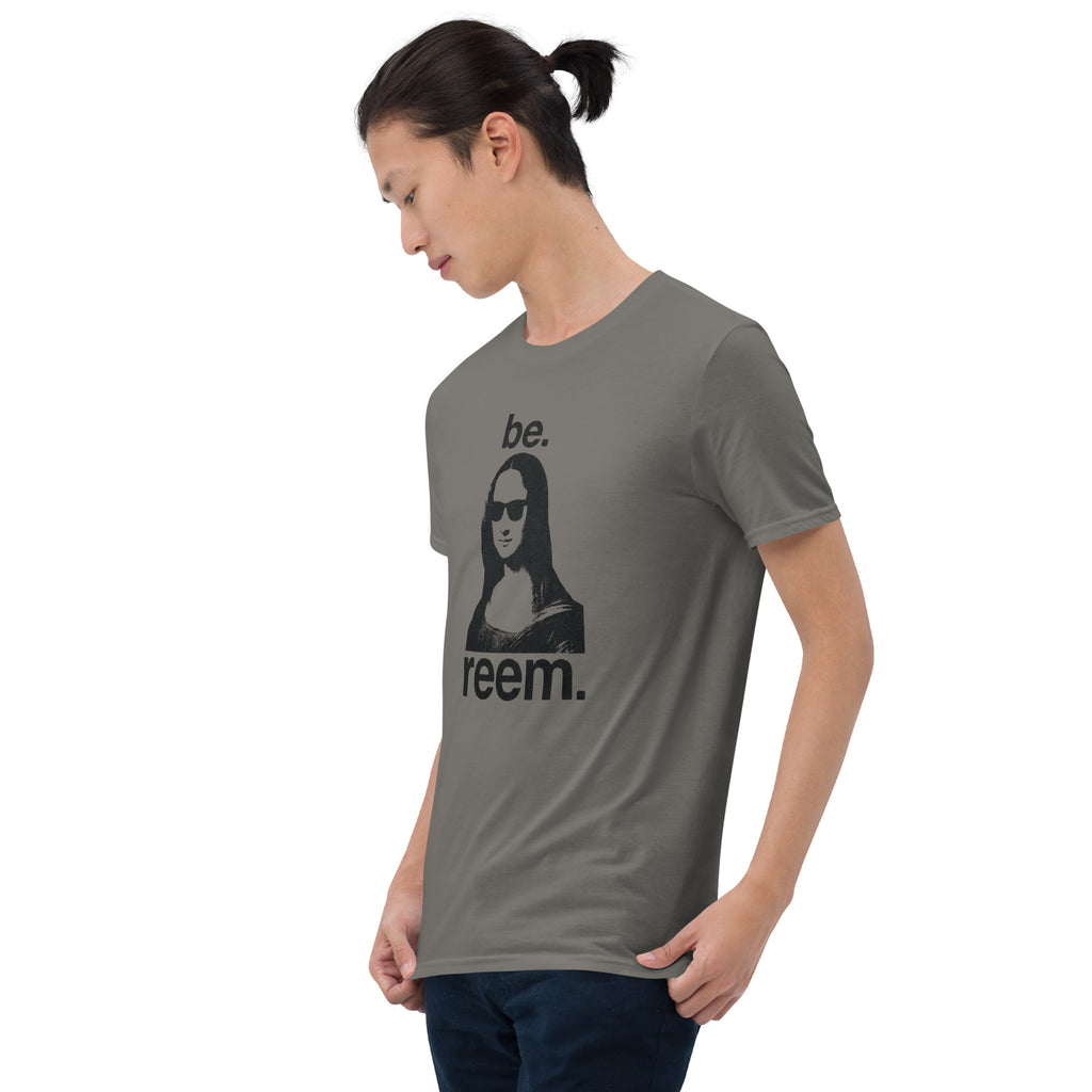 Be Reem Mona Lisa CLASSIC unisex tee in charcoal, showcasing soft fabric and relaxed fit from Reem Tees.