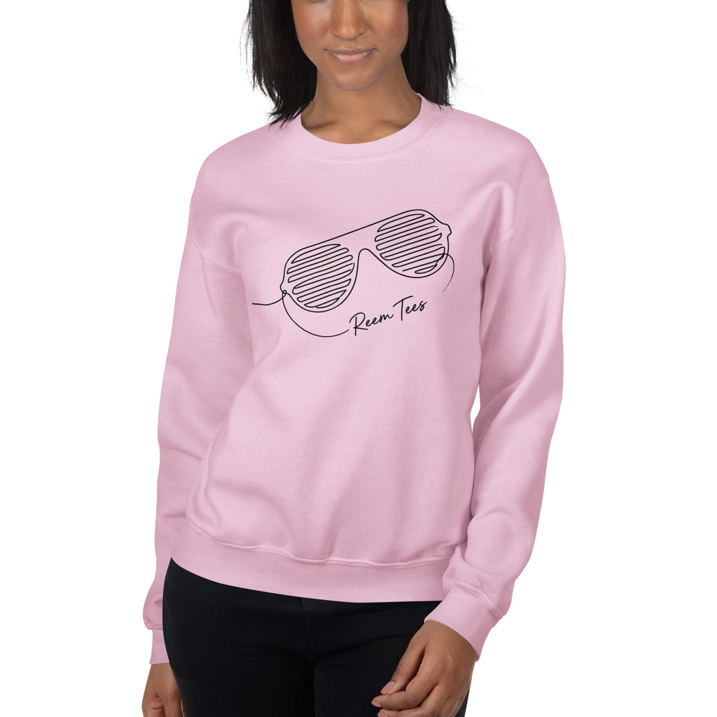 Light pink unisex crew neck sweatshirt featuring Be Reem line art design from Reem Tees.